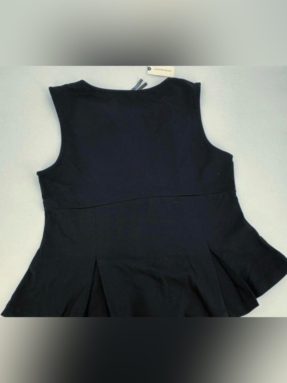 1 hour sale. Anthropologie, Medium Black Sleeveless Zip Front Peplum Top - Picture 11 of 15